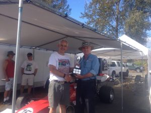 Collin Jackson receives the Chairman's Trophy from BCHMR Chairman and VRCBC President, Stanton Guy. - VRCBC photo