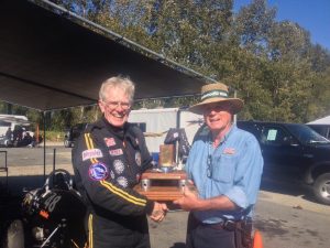 Paul Higgins receives the Abbotsford Trophy from VRCBC President Stanton Guy - VRCBC photo